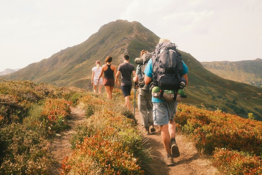 Group of hikers on a ridge trail